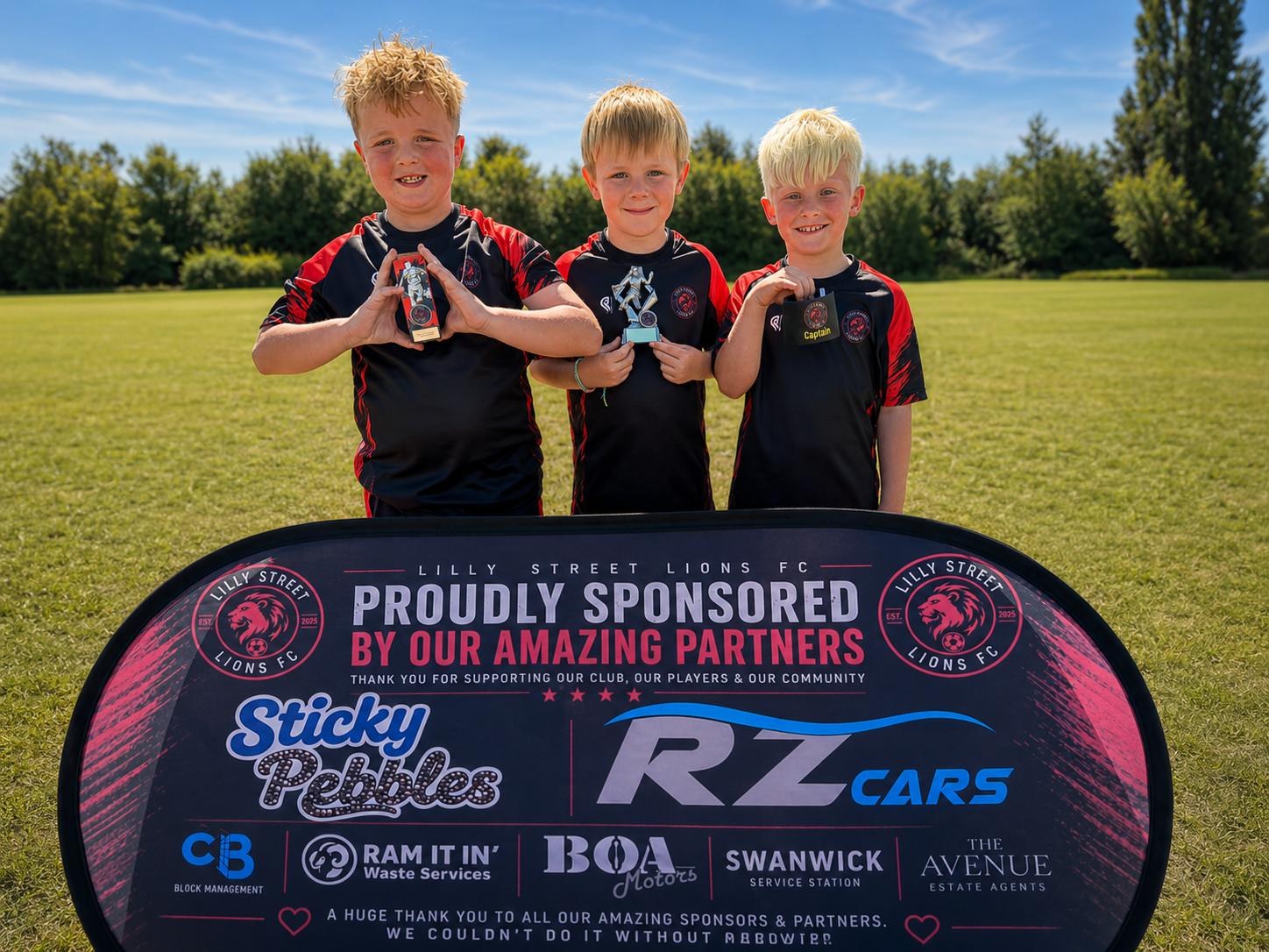 Three Under-8 players with awards and captain recognition