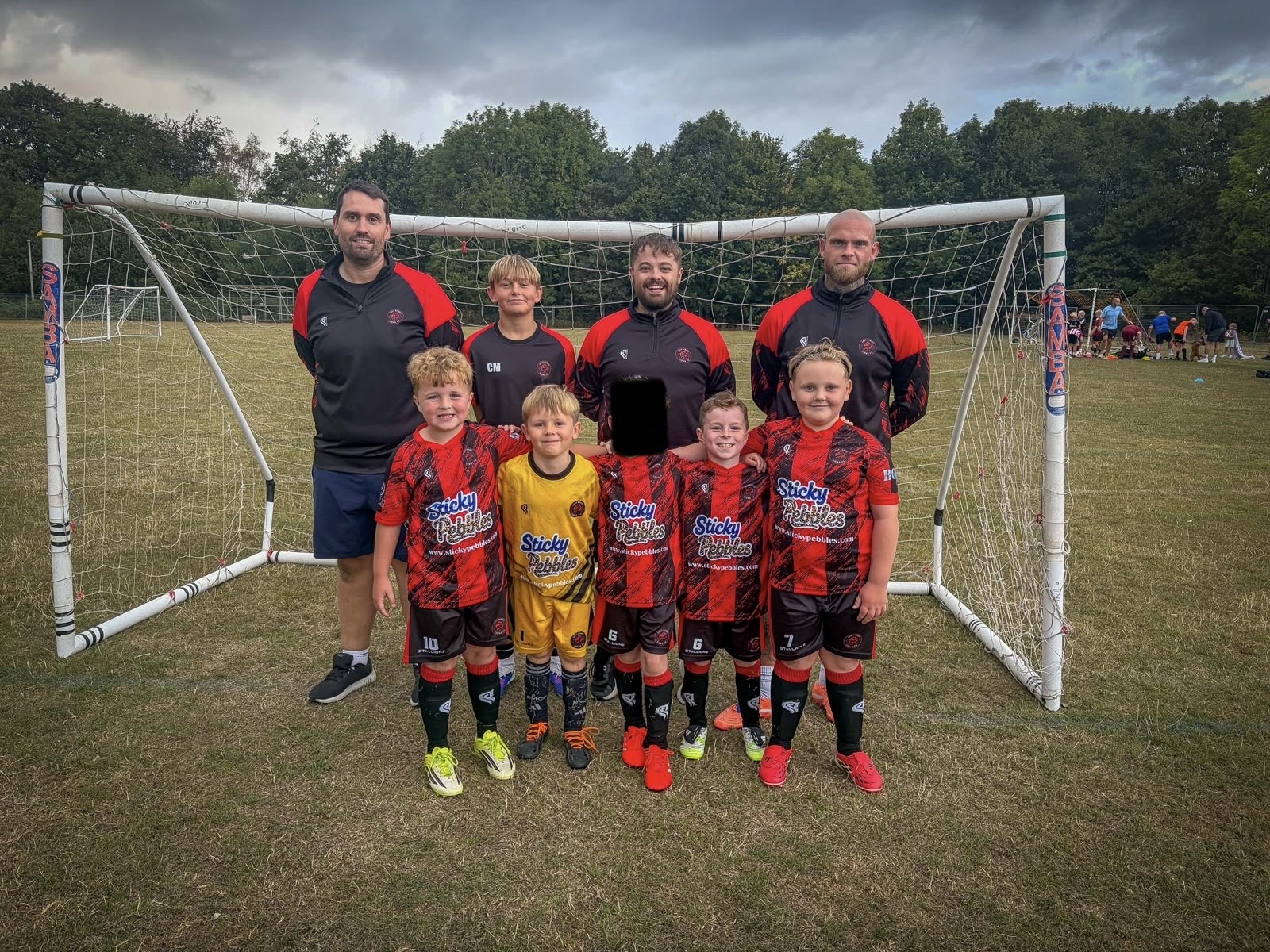 Lilly Street Lions FC Under-8 players and coaches together